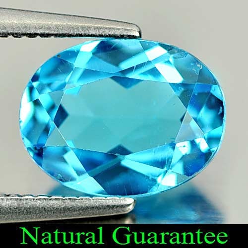 Natural Swiss Blue Topaz 1.96 Ct. Oval Shape 8.9 x 6.9 Mm. Gemstone From Brazil: Product ID: 807164152 Product Name: Natural Blue Topaz Weight: 1.96 CT. Size: 8.9 x 6.9 x 4 MM. Shape: Oval Color: Swiss Blue Clarity:VSI Luster: Good Gems Origin: Brazil Treatment: Treated Crystal St