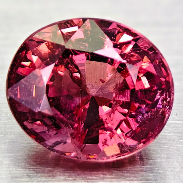 Natural Reddish Pink Rhodolite Garnet 1.61 Ct. Oval Shape 6.9 x 6 Mm Gemstone From Africa: Product ID: 102900600 Product Name: Natural Rhodolite Weight: 1.61 CT. Size: 6.9 x 6 x 4.6 MM. Shape: Oval Color: Reddish Pink Clarity:SI Luster: Good Gems Origin: Africa Treatment: Unheated Crystal S