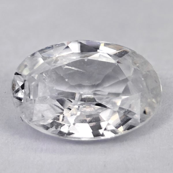 Natural White Zircon 0.97 Ct. Oval Shape 7 x 5 Mm. Gemstone From Cambodia: Product ID: 807742853 Product Name: Natural Zircon Weight: 0.97 CT. Size: 7 x 5 x 2.8 MM. Shape: Oval Color: White Clarity:VSI Luster: Good Gems Origin: Cambodia Treatment: Heated Crystal Structure: T