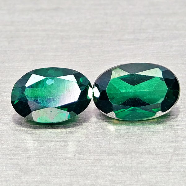 Natural Bluish Green Topaz 1.04 Ct. 2 Pcs Oval Shape 6.2 x 4.1 Mm Gemstones From Brazil: Product ID: 807168071 Product Name: Natural Topaz Weight: 1.04 CT. Size: 6.2 x 4.1 x 2.7 MM. Shape: Oval Color: Bluish Green Clarity:VSI Luster: Good Gems Origin: Brazil Treatment: Treated Crystal Str