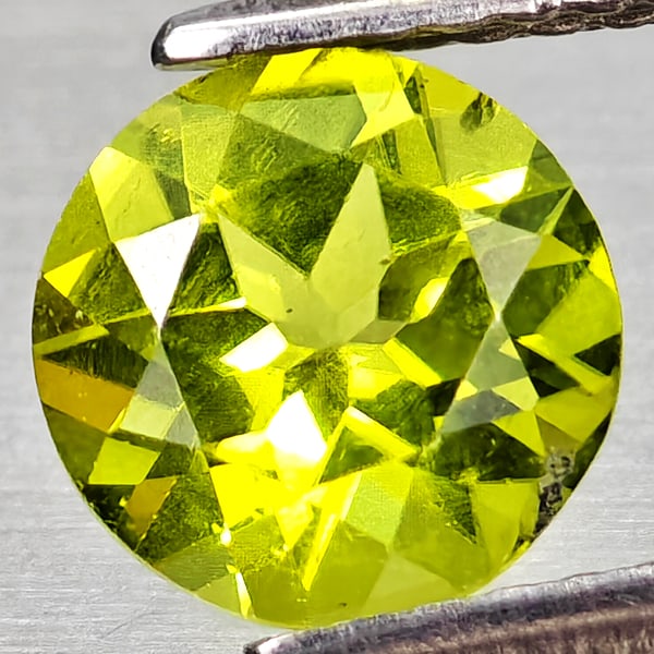 Natural Green Peridot 1.27 Ct. Round Shape 7 Mm. Gemstone From Pakistan: Product ID: 805317205 Product Name: Natural Peridot Weight: 1.27 CT. Size: 7 x 7 x 4.1 MM. Shape: Round Color: Green Clarity:VSI Luster: Good Gems Origin: Pakistan Treatment: Unheated Crystal Structur