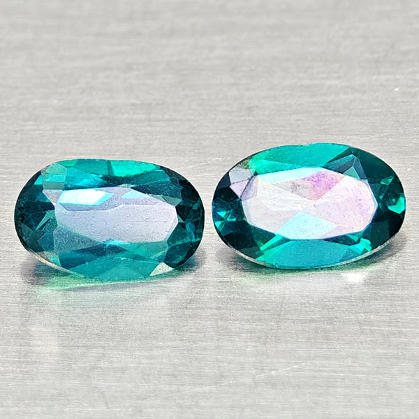 Natural Bluish Green Topaz 0.96 Ct. 2 Pcs Oval Shape 6.1 x 4 Mm Gemstones From Brazil: Product ID: 807168072 Product Name: Natural Topaz Weight: 0.96 CT. Size: 6.1 x 4 x 2.4 MM. Shape: Oval Color: Bluish Green Clarity:VSI Luster: Good Gems Origin: Brazil Treatment: Treated Crystal Struc