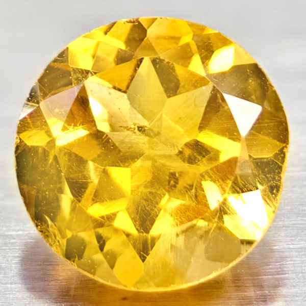 Natural Yellow Citrine 1.14 Ct. Round Shape 7 Mm. Gemstone From Brazil: Product ID: 801813567 Product Name: Natural Citrine Weight: 1.14 CT. Size: 7 x 7 x 4.5 MM. Shape: Round Color: yellow Clarity:VVS Luster: Good Gems Origin: Brazil Treatment: Unheated Crystal Structure