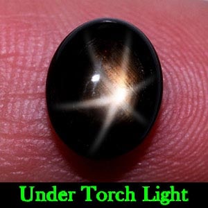 Natural Black Star Sapphire 6 Rays 2.84 Ct. Oval Cabochon Shape 8.9 x 7.2 Mm. Gemstone: Product ID: 806134507 Product Name: Natural Star Sapphire Weight: 2.84 CT. Size: 8.9 x 7.2 x 4.1 MM. Shape: Oval Cabochon Color: Black Clarity:Opaque Luster: Good 6 Rays Star Gems Origin: Thailand Tre