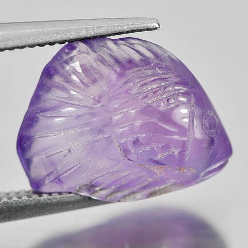 Purple Amethyst Fish Carving 3.98 Ct. Unheated Natural Gemstone From Brazil: Product ID: 810303620 Product Name: Natural Amethyst Weight: 3.98 CT. Size: 12.9 x 9.8 x 5.6 MM. Shape: Fish Carving Color: Purple Clarity:Semi - Transparent Luster: Good Gems Origin: Brazil Treatment