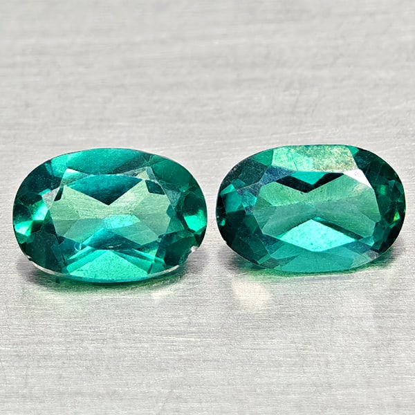 Natural Bluish Green Topaz 1.18 Ct. 2 Pcs Oval Shape 6.1 x 4 Mm Gemstones From Brazil: Product ID: 807168073 Product Name: Natural Topaz Weight: 1.18 CT. Size: 6.1 x 4 x 2.9 MM. Shape: Oval Color: Bluish Green Clarity:VSI Luster: Good Gems Origin: Brazil Treatment: Treated Crystal Struc