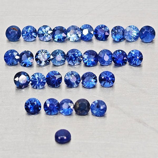 Natural Blue Sapphire 1.41 Ct. 31 Pcs Round Diamond Cut 2.1 Mm Gemstones From Madagascar: Product ID: 806162660 Product Name: Natural Blue Sapphire Weight: 1.41 CT. Size: 2.1 x 2.1 x 1.2 MM. Shape: Round Diamond Cut Color: Blue Clarity:VSI Luster: Very Good Gems Origin: Madagascar Treatmen