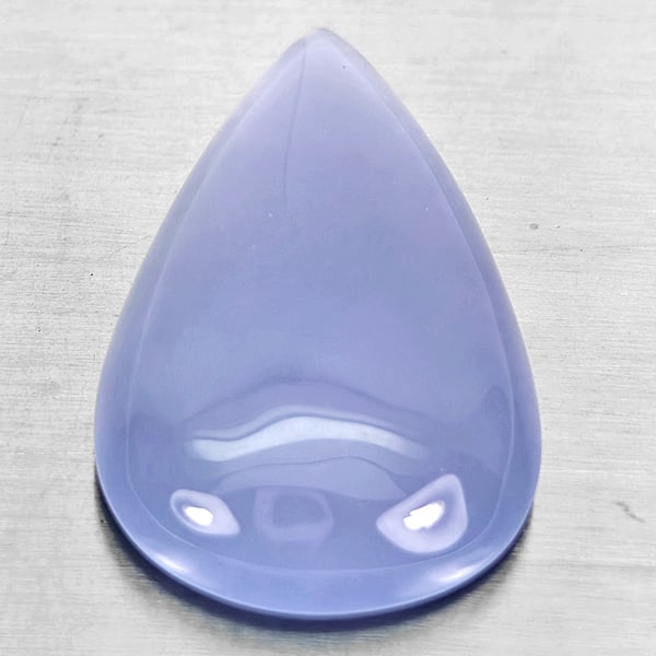 Natural Lavender Chalcedony 27.11 Ct. Pear Cabochon Shape 30 x 18.9 Mm Gemstone From Russia: Product ID: 801502694 Product Name: Natural Chalcedony Weight: 27.11 CT. Size: 30 x 18.9 x 7.6 MM. Shape: Pear Cabochon Color: Lavender Clarity:Semi - Transparent Luster: Good Gems Origin: Russia Trea