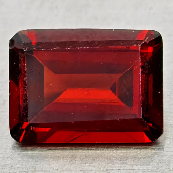 Natural Orangish Red Garnet 1.46 Ct. Octagon Shape 7.8 x 5.9 Mm Gemstone From Tanzania: Product ID: 802937023 Product Name: Natural Red Garnet Weight: 1.46 CT. Size: 7.8 x 5.9 x 3.3 MM. Shape: Octagon Color: Orangish Red Clarity:VSI - SI1 Luster: Good Gems Origin: Tanzania Treatment: Unh