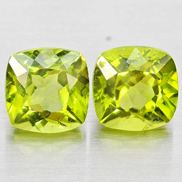 Natural Green Peridot 2.68 Ct. 2Pcs Cushion Shape 6.1 Mm Gemstones From Pakistan: Product ID: 805317393 Product Name: Natural Peridot Weight: 2.68 CT. Size: 6.1 x 6.1 x 4.4 MM. Shape: Cushion Shape Color: Green Clarity:VSI - SI1 Luster: Good Gems Origin: Pakistan Treatment: Unheate