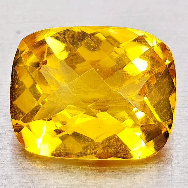 Natural Yellow Citrine 2.71 Ct. Cushion Checkerboard Cut 10.2 Mm. Gemstone From Brazil: Product ID: 801815213 Product Name: Natural Citrine Weight: 2.71 CT. Size: 10.2 x 8.2 x 5.6 MM. Shape: Cushion Checkerboard Cut Color: Yellow Clarity:VVS - VSI Luster: Good Gems Origin: Brazil Treatme