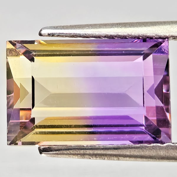 Natural Bi Color Ametrine 3.50 Ct. Octagon Shape 11.1 x 7.2 Mm Gemstone From Bolivia: Product ID: 800408406 Product Name: Natural Ametrine Weight: 3.50 CT. Size: 11.1 x 7.2 x 5.4 MM. Shape: Octagon Color: Bi Color Clarity:VSI - SI1 Luster: Good Gems Origin: Bolivia Treatment: Unheated 