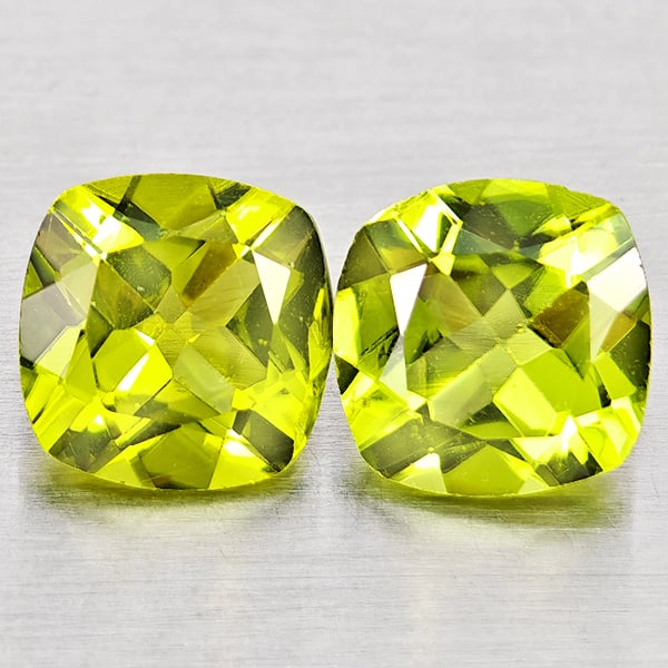 Natural Green Peridot 1.78 Ct. 2Pcs Cushion Shape 6.1 Mm Gemstones From Pakistan: Product ID: 805317394 Product Name: Natural Peridot Weight: 1.78 CT. Size: 6.1 x 6.1 x 3.4 MM. Shape: Cushion Shape Color: Green Clarity:VSI - SI1 Luster: Good Gems Origin: Pakistan Treatment: Unheate