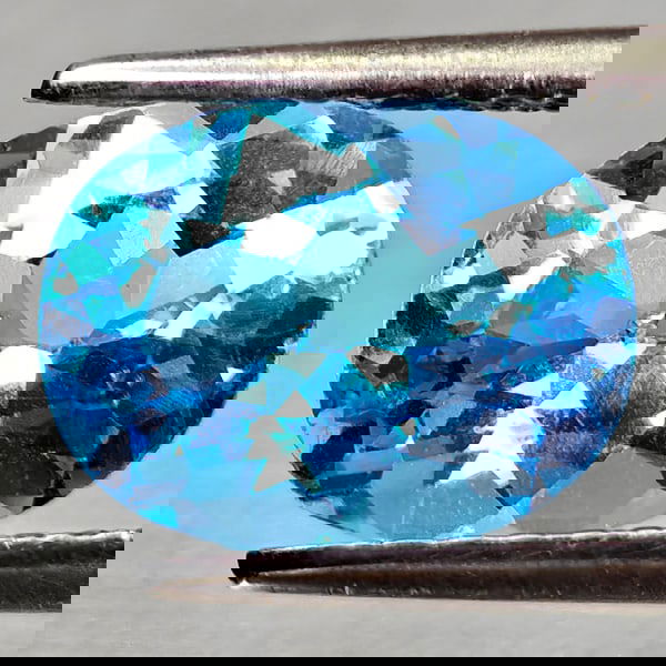 Natural Swiss Blue Topaz 2.14 Ct. Oval Shape 9.2 x 7.1 Mm Gemstone From Brazil: Product ID: 807168159 Product Name: Natural Blue Topaz Weight: 2.14 CT. Size: 9.2 x 7.1 x 4.5 MM. Shape: Oval Shape Color: Swiss Blue Clarity:VVS - VSI Luster: Good Gems Origin: Brazil Treatment: Trea