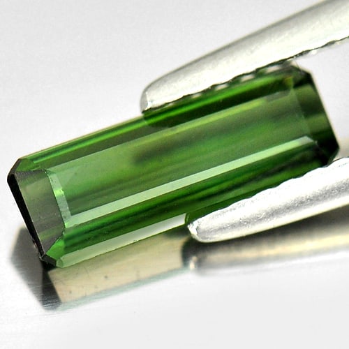 Natural Green Tourmaline 1.05 Ct. Octagon Shape 10.2 x 3.7 Mm. Gemstone from Nigeria: Product ID: 807249581 Product Name: Natural Tourmaline Weight: 1.05 CT. Size: 10.2 x 3.7 x 2.7 MM. Shape: Octagon Color: Green Clarity:VSI Luster: Good Gems Origin: Nigeria Treatment: Unheated Crystal