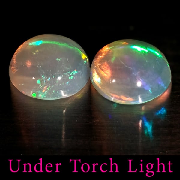 Natural Multi Color Opal 1.60 Ct. 2 Pcs Round Cabochon Shape 7 Mm Gemstones From EThiopia: Product ID: 818728272 Product Name: Natural Opal Weight: 1.60 CT. Size: 7 x 7 x 3.6 MM. Shape: Round Color: Multi-Color Clarity:Semi - Transparent Luster: Good Gems Origin: Ethiopia Treatment: Unheate