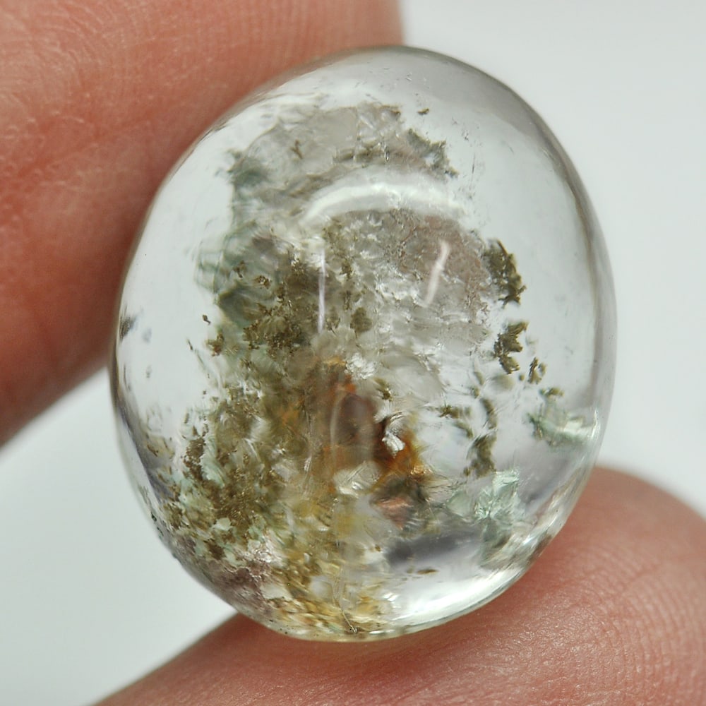 Natural Moss Quartz 22.79 Ct. Oval Cabochon Shape 19 x 16.4 Mm. Gemstone From Thailand: Product ID: 805529351 Product Name: Natural Quartz Weight: 22.79 CT. Size: 19 x 16.4 x 10.6 MM. Shape: Oval Cabochon Color: White Clarity:Semi - Transparent Luster: Good Gems Origin: Thailand Treatmen