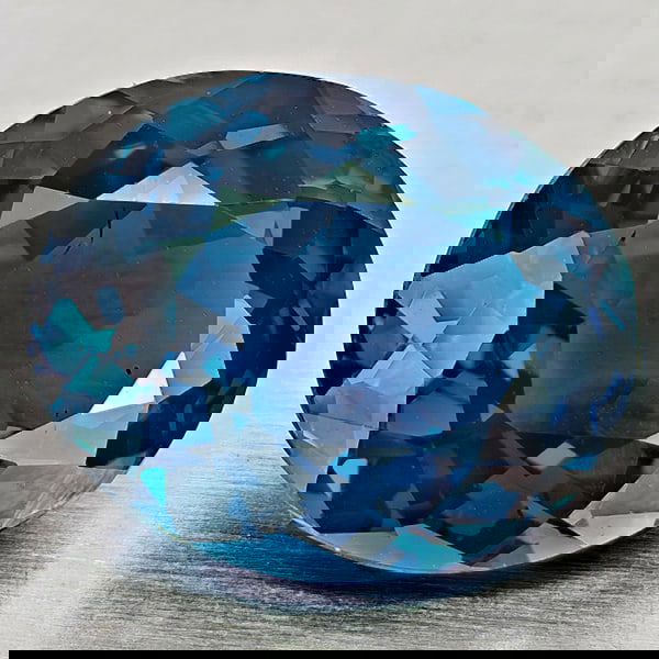 Natural London Blue Topaz 4.06 Ct. Oval Shape 10.6 x 8.8 Mm Gemstone From Brazil: Product ID: 807168395 Product Name: Natural Blue Topaz Weight: 4.06 CT. Size: 10.6 x 8.8 x 5.8 MM. Shape: Oval Shape Color: London Blue Clarity:VVS - VSI Luster: Good Gems Origin: Brazil Treatment: Tr