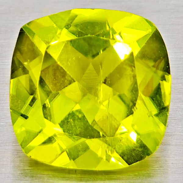 Natural Green Peridot 1.59 Ct. Cushion Shape 7.2 Mm Gemstone From Pakistan: Product ID: 805317267 Product Name: Natural Peridot Weight: 1.59 CT. Size: 7.2 x 7.2 x 4.2 MM. Shape: Cushion Shape Color: Green Clarity:VSI - SI1 Luster: Good Gems Origin: Pakistan Treatment: Unheate