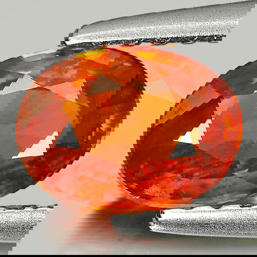 Natural Orange Spessartine Garnet 0.89 Ct. Oval Shape 6.8 x 5 Mm. Gemstone From Nigeria (1 of 3)