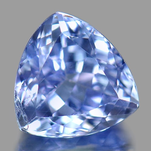 Natural Violet Blue Tanzanite 1.48 Ct. Trilliant Shape 6.9 Mm. Gemstone From Tanzania: Product ID: 807004652 Product Name: Natural Tanzanite Weight: 1.48 CT. Size: 6.9 x 6.9 x 4.5 MM. Shape: Trilliant Color: Violet Blue Clarity:SI1 Luster: Good Gems Origin: Tanzania Treatment: Heated Cr