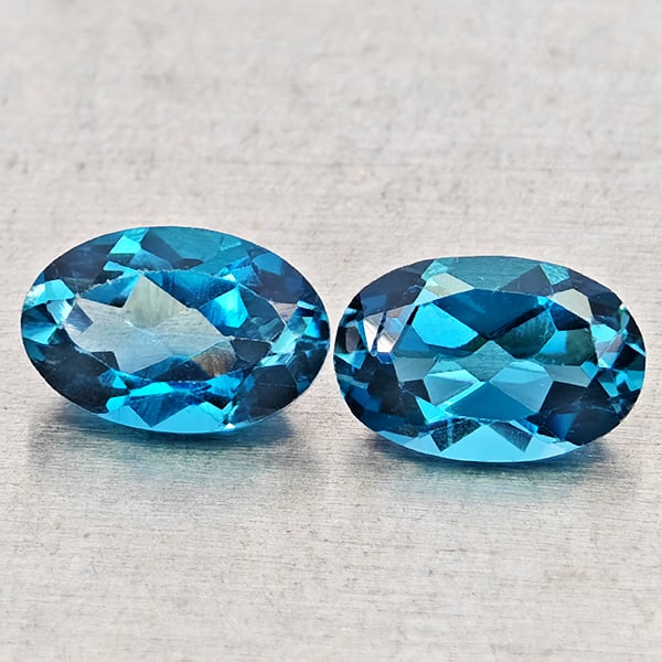 Natural London Blue Topaz 1.06 Ct. 2 Pcs Oval Shape 6.1 x 4 Mm Gemstones From Brazil: Product ID: 807168460 Product Name: Natural Blue Topaz Weight: 1.06 CT. Size: 6.1 x 4 x 2.7 MM. Shape: Oval Shape Color: London Blue Clarity:VSI - SI1 Luster: Good Gems Origin: Brazil Treatment: Treat