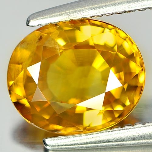 Natural Yellow Sapphire 1.57 Ct. Oval Shape 7.6 x 6.4 Mm. Gemstone From Thailand: Product ID: 806142630 / Product Name: Natural Yellow Sapphire / Weight: 1.57 CT. / Size: 7.6 x 6.4 x 3.6 MM. / Shape: Oval / Color: Yellow / Clarity:VSI / Luster: Very Good / Gems Origin: Thailand / T