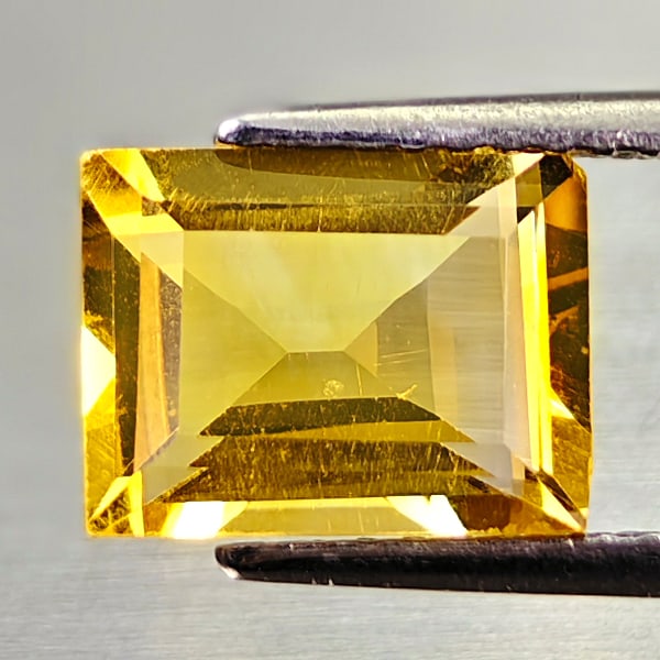 Natural Yellow Citrine 2.03 Ct. Baguette Shape 6.2 x 7.1 Mm Gemstone From Brazil: Product ID: 801815020 Product Name: Natural Citrine Weight: 2.03 CT. Size: 6.2 x 7.1 x 4.4 MM. Shape: Baguette Color: Yellow Clarity:VSI Luster: Good Gems Origin: Brazil Treatment: Unheated Crystal St