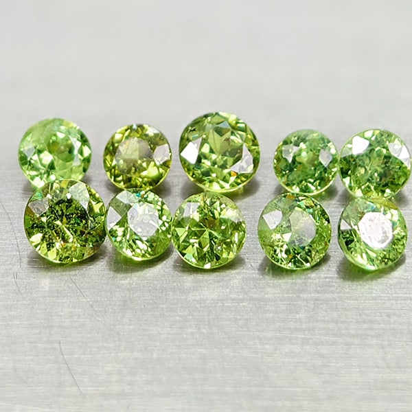Natural Green Demantoid Garnet 1.59 Ct. 10 Pcs. Round Diamond Cut 3.3 Mm Gemstones From Madagascar: Product ID: 802936441 Product Name: Natural Demantoid Weight: 1.59 CT. Size: 3.3 x 3.3 x 2.3 MM. Shape: Round Diamond Cut Color: Green Clarity:VVS Luster: Good Gems Origin: Madagascar Treatment: Unhea