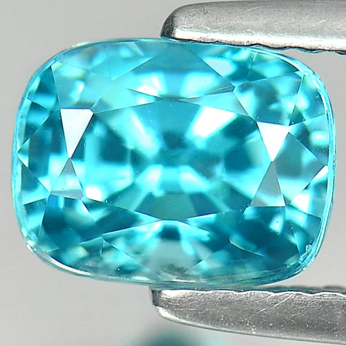 Natural Blue Zircon 2.78 Ct. Cushion Shape 7.7 x 5.9 Mm. Gemstone From Cambodia: Product ID: 807727358 Product Name: Natural Zircon Weight: 2.78 CT. Size: 7.7 x 5.9 x 5.7 MM. Shape: Cushion Color: Blue Clarity:VSI Luster: Good Gems Origin: Cambodia Treatment: Heated Crystal Struct