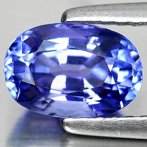 Natural Violetish Blue Tanzanite 1.35 Ct. Oval Shape 7.9 x 5.4 Gemstone From Tanzania: Product ID: 807006360 Product Name: Natural Tanzanite Weight: 1.35 CT. Size: x 4.2 MM. Shape: Oval Color: Blue Clarity:SI Luster: Good Gems Origin: Tanzania Treatment: Heated Crystal Structure: Orthor