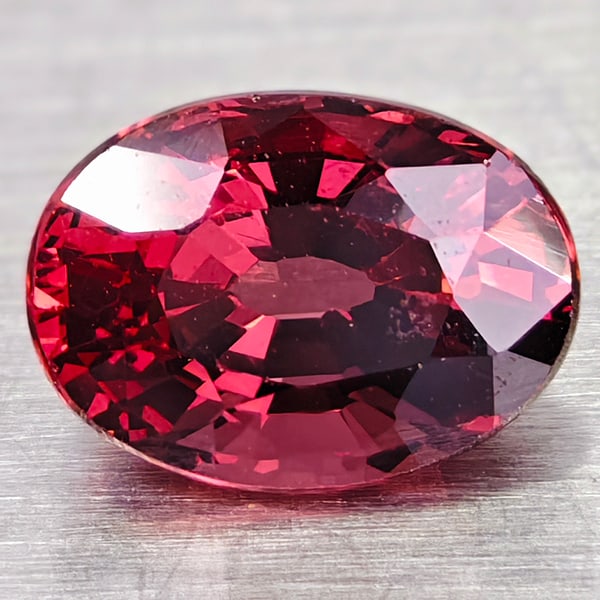 Natural Red Pink Rhodolite Garnet 0.98 Ct. Oval Shape 6.6 x 4.8 Mm Gemstone From Madagascar: Product ID: 102907105 Product Name: Natural Rhodolite Weight: 0.98 CT. Size: 6.6 X 4.8 X 3.8 MM. Shape: OVAL Color: RED PINK Clarity:IF Luster: GOOD Gems Origin: MADAGASCAR Treatment: UNHEATED Crystal