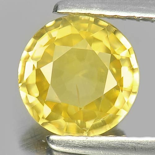 Natural Yellow Zircon 1.98 Ct. Round Shape 7.3 Mm. Gemstone From Cambodia: Product ID: 807729304 Product Name: Natural Zircon Weight: 1.98 CT. Size: 7.3 x 7.3 x 3.5 MM. Shape: Round Color: Yellow Clarity:VSI Luster: Good Gems Origin: Cambodia Treatment: Heated Crystal Struct