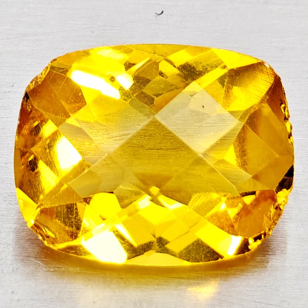 Natural Yellow Citrine 2.11 Ct. Cushion Checkerboard Cut 10.2 x 8.1 Mm. Gemstone From Brazil: Product ID: 801815164 Product Name: Natural Citrine Weight: 2.11 CT. Size: 10.2 x 8.1 x 4.7 MM. Shape: Cushion Checkerboard Cut Color: Yellow Clarity:VVS - VSI Luster: Good Gems Origin: Brazil Treatme