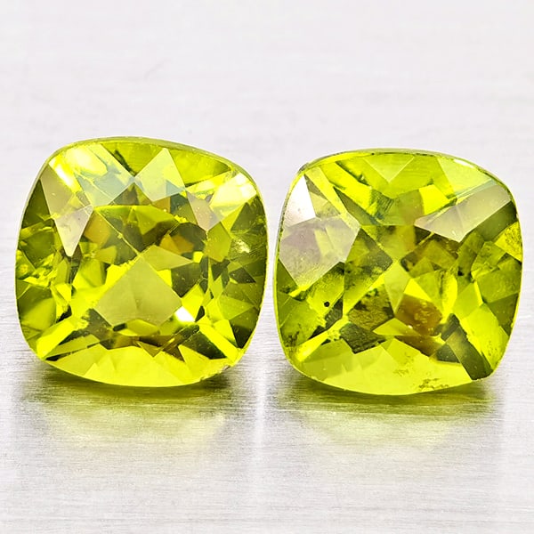 Natural Green Peridot 2.43 Ct. 2Pcs Cushion Shape 6.2 Mm Gemstones From Pakistan: Product ID: 805317398 Product Name: Natural Peridot Weight: 2.43 CT. Size: 6.2 x 6.2 x 4.5 MM. Shape: Cushion Shape Color: Green Clarity:VSI - SI1 Luster: Good Gems Origin: Pakistan Treatment: Unheate