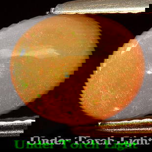 Natural Multi Color Play Of Colour Opal 1.93 Ct. Oval Shape 9.8 x 8 Mm. Gemstone From Ethiopia: Product ID: 818725779 Product Name: Natural Opal Weight: 1.93 CT. Size: 9.8 x 8 x 5 MM. Shape: Oval Cabochon Color: Multi-Color Clarity:Semi - Transparent Luster: Iridescent Gems Origin: Ethiopia Trea