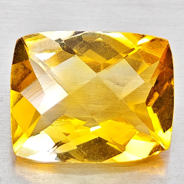 Natural Yellow Citrine 2.69 Ct. Cushion Checkerboard Cut 10.1 x 8.2 Mm. Gemstone from Brazil: Product ID: 801815205 Product Name: Natural Citrine Weight: 2.69 CT. Size: 10.1 x 8.2 x 5.2 MM. Shape: Cushion Checkerboard Cut Color: Yellow Clarity:VVS - VSI Luster: Good Gems Origin: Brazil Treatme