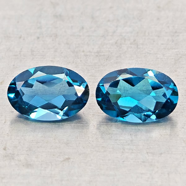 Natural London Blue Topaz 1.04 Ct. 2 Pcs Oval Shape 6 x 4 Mm Gemstones from Brazil: Product ID: 807168463 Product Name: Natural Blue Topaz Weight: 1.04 CT. Size: 6 x 4 x 2.8 MM. Shape: Oval Shape Color: London Blue Clarity:VSI - SI1 Luster: Good Gems Origin: Brazil Treatment: Treated