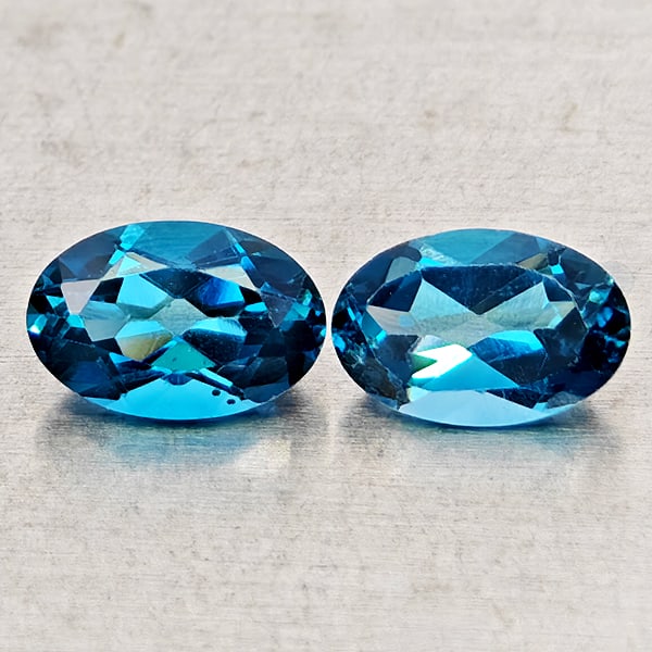 Natural London Blue Topaz 1.05 Ct. 2 Pcs Oval Shape 6 x 4 Mm Gemstones From Brazil: Product ID: 807168464 Product Name: Natural Blue Topaz Weight: 1.05 CT. Size: 6 x 4 x 2.6 MM. Shape: Oval Shape Color: London Blue Clarity:VSI - SI1 Luster: Good Gems Origin: Brazil Treatment: Treated