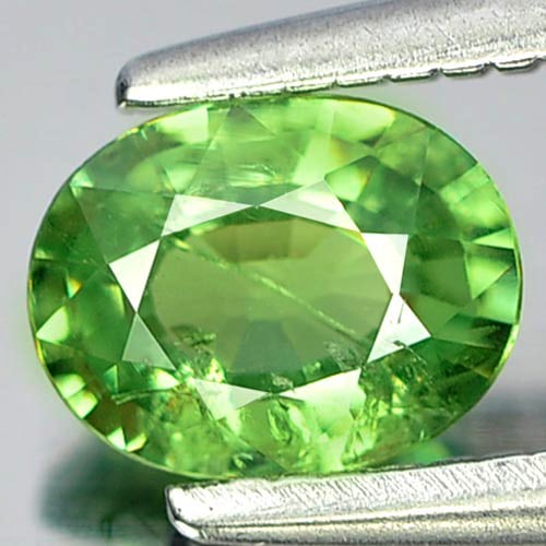 Natural Green Demantoid Garnet 0.54 Ct. Oval Shape 5.8 x 4.5 Mm Unheated Gemstone From Madagascar: Product ID: 802912877 Product Name: Natural Demantoid Weight: 0.54 CT. Size: 5.8 x 4.5 x 2.4 MM. Shape: Oval Color: Green Clarity:SI Luster: Good Gems Origin: Madagascar , Africa Treatment: Unheated C