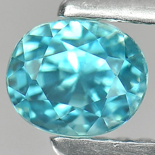 Natural Blue Zircon 1.09 Ct. Clean Oval Shape 5.4 x 4.5 Mm. Gemstone From Cambodia: Product ID: 807709557 Product Name: Natural Zircon Weight: 1.09 CT. Size: 5.4 x 4.5 x 4.7 MM. Shape: Oval Color: Blue Clarity:IF Luster: Good Gems Origin: Cambodia Treatment: Heated Crystal Structure: