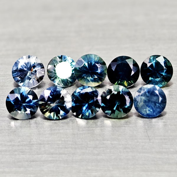 Natural Fancy Color Sapphire 1.39 Ct. 10 Pcs Round Diamand Cut 3.1 Mm Gemstones From Tanzania: Product ID: 806162157 Product Name: Natural Green Sapphire Weight: 1.39 CT. Size: 3.1 x 3.1 x 2.1 MM. Shape: Round Diamond Cut Color: Fancy Color Clarity:VSI Luster: Very Good Gems Origin: Tanzania Tr