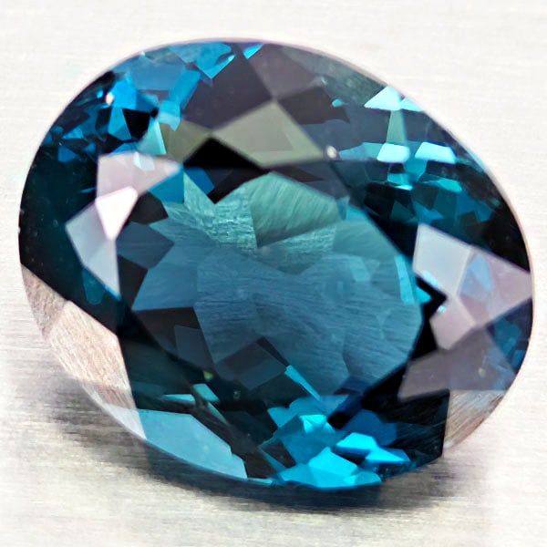 Natural London Blue Topaz 3.83 Ct. Oval Shape 8.4 x 10.2 Mm Gemstone From Brazil: Product ID: 807168411 Product Name: Natural Blue Topaz Weight: 3.83 CT. Size: 8.4 x 10.2 x 5.8 MM. Shape: Oval Color: London Blue Clarity:VVS - VSI Luster: Very Good Gems Origin: Brazil Treatment: Tre