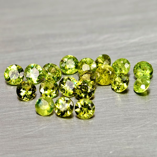 Natural Yellowish Green Demantoid Garnet 1.26 Ct. 19 Pcs Round Diamond Cut 2.5 Mm Gemstones: Product ID: 802936577 Product Name: Natural Demantoid Weight: 1.26 CT. Size: 2.5 x 2.5 x 1.5 MM. Shape: Round Diamond Cut Color: Yellowish Green Clarity:VSI Luster: Good Gems Origin: Madagascar Treatm