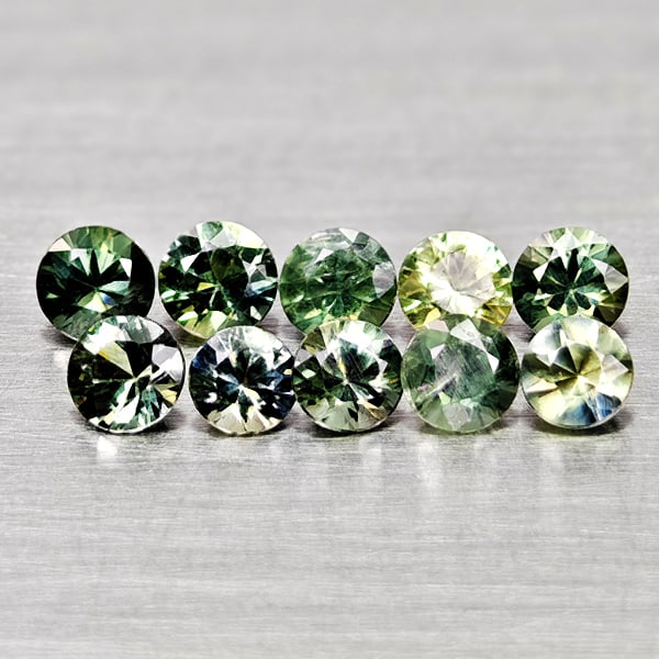 Natural Fancy Color Sapphire 1.18 Ct. 10 Pcs Round Diamand Cut 3.1 Mm Gemstones From Tanzania: Product ID: 806162154 Product Name: Natural Green Sapphire Weight: 1.18 CT. Size: 3.1 x 3.1 x 2.1 MM. Shape: Round Diamond Cut Color: Fancy Color Clarity:VSI Luster: Very Good Gems Origin: Tanzania Tr