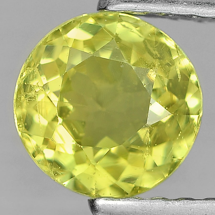 Natural Green Mali Garnet 0.97 Ct. Round Shape 6 Mm. Gemstone From Madagascar: Product ID: 802936093 Product Name: Natural Mali Garnet Weight: 0.97 CT. Size: 6 x 3.4 MM. Shape: Round Color: Green Clarity:SI1 Luster: Good Gems Origin: Madagascar Treatment: Unheated Crystal Struct