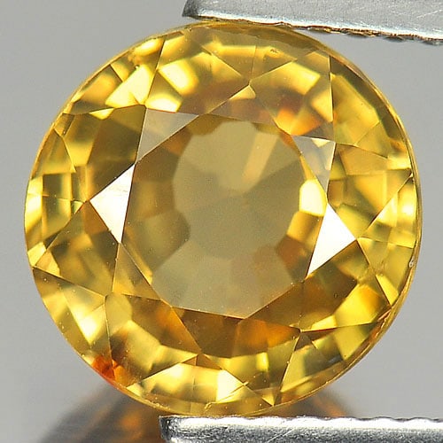 Natural Yellow Zircon 4.69 Ct. VS Round Shape 9 Mm. Gemstone From Cambodia: Product ID: 807729395 Product Name: Natural Zircon Weight: 4.69 CT. Size: 9 x 9 x 5.4 MM. Shape: Round Color: Yellow Clarity:VS Luster: Very Good Gems Origin: Cambodia Treatment: Heated Crystal Struct