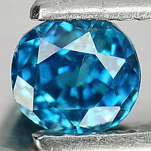 Natural Blue Zircon 1.18 Ct. Oval Shape 5.1 x 4.7 Mm Gemstone From Cambodia: Product ID: 807728670 Product Name: Natural Zircon Weight: 1.18 CT. Size: 5.1 x 4.7 x 4.6 MM. Shape: Oval Color: Blue Clarity:VSI Luster: Good Gems Origin: Cambodia Treatment: Heated Crystal Structure