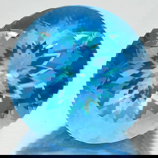 Natural Swiss Blue Topaz 14.92 Ct. Clean Round Cornflower Cut 15 Mm. Gemstone From Brazil: Product ID: 807166771 Product Name: Natural Blue Topaz Weight: 14.92 CT. Size: 15 x 15 x 10.3 MM. Shape: Round Color: Blue Clarity:IF Luster: Good Gems Origin: Brazil Treatment: Treated Crystal Struct