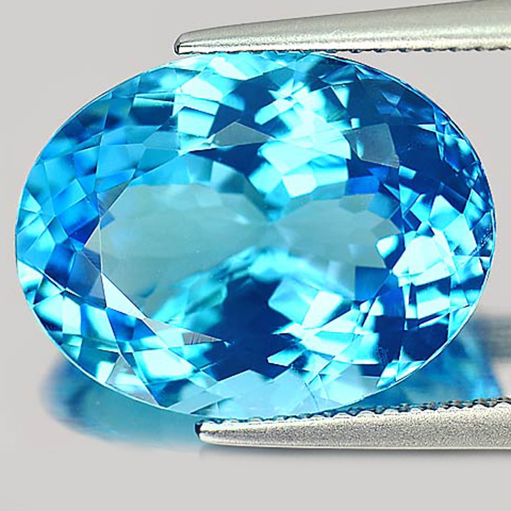 Natural Swiss Blue Topaz 12.10 Ct. VVS Oval Shape 16.5 x 12.7 Mm. Gemstone From Brazil: Product ID: 807164382 Product Name: Natural Blue Topaz Weight: 12.10 CT. Size: 16.5 x 12.7 x 7.7 MM. Shape: Oval Color: Blue Clarity:VVS Luster: Very Good Gems Origin: Brazil Treatment: Treated Crysta